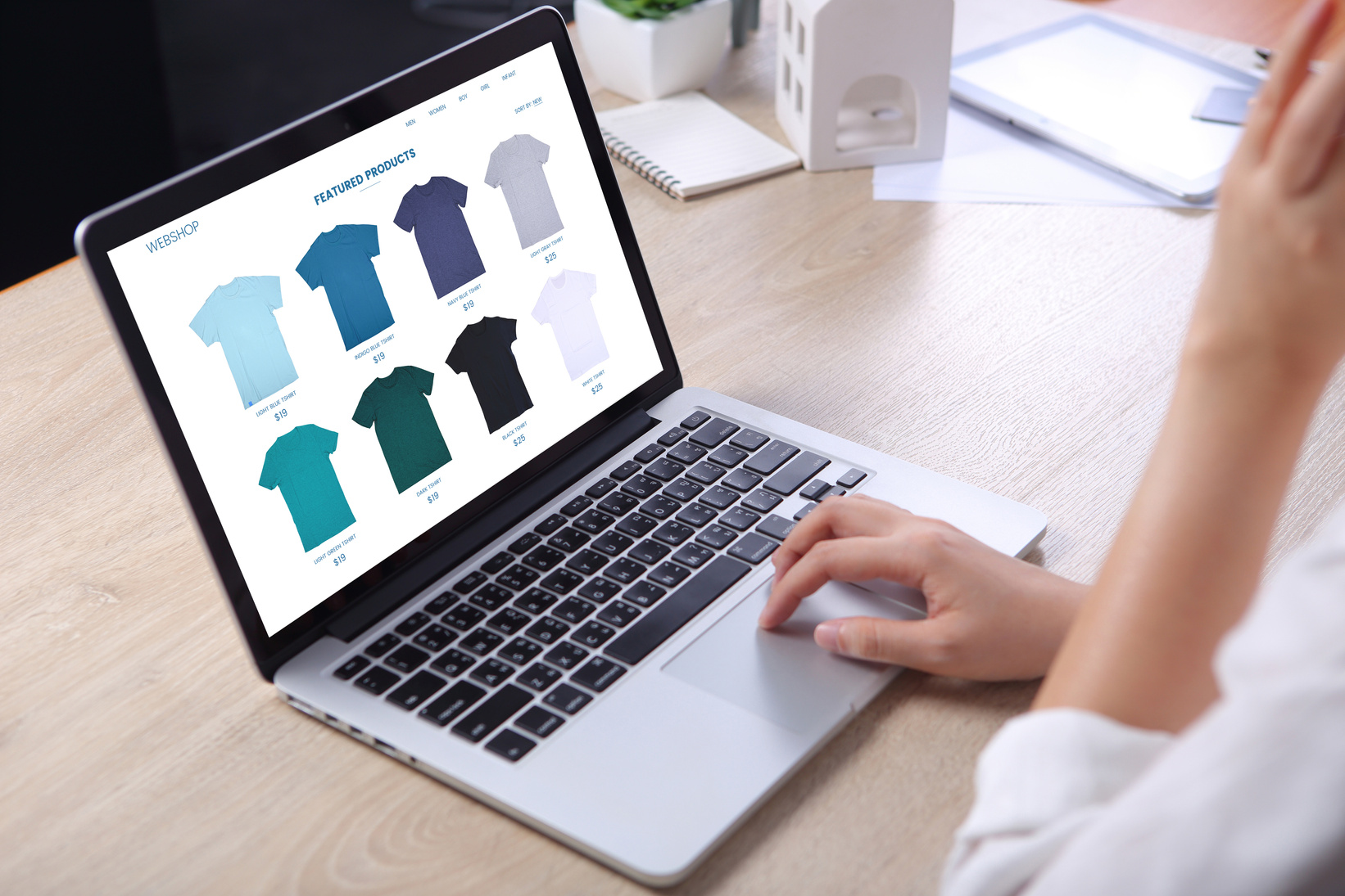 Woman Choosing Tshirt on E-commerce Webshop
